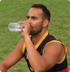 Athlete drinking water